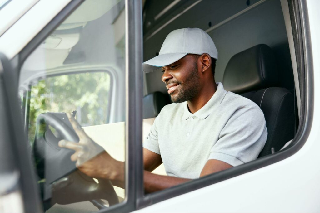 Man driving a large commercial vehicle